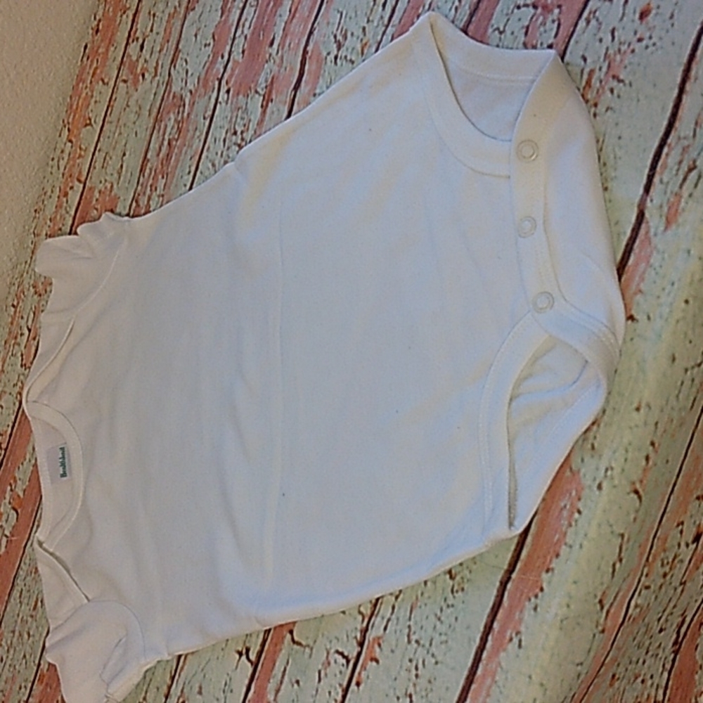 Baby one piece Bodysuit. Snap buttons at crotch.